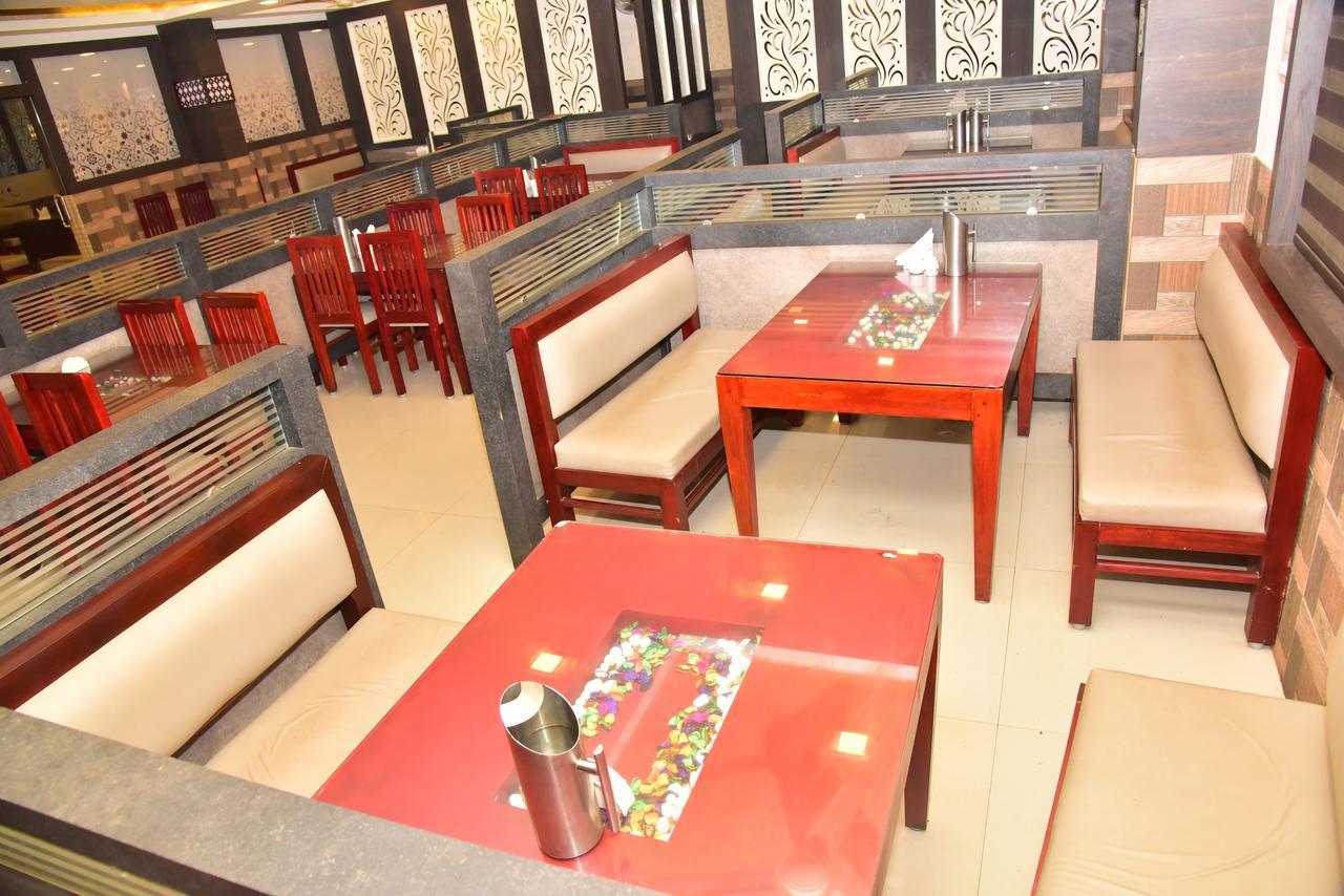 Hôtel Bright Palace Restaurant And Residency à Shimoga Extérieur photo